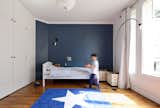 “All interior walls were removed to create four individual rooms on the sixth floor,” Hammer says. The two children and the new baby share a bathroom. And in their bedrooms, storage continues to be key.