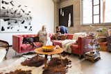 Michelle Morrison and her two greyhounds pose with her brother and roommate, Michael Anthony Morrison—an artist who is also responsible for much of her art collection.