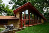 The uniquely large Elam House is a Usonian Home located in Southern Minnesota and is one of only 13 Wright homes in the state. Built in 1951, the home features five bedrooms, six bathrooms, three floor-to-ceiling fireplaces, two living rooms with soaring ceilings, a cantilevered balcony, over 100 windows, rare white cypress wood and massive limestone piers, and stonework comparable to Wright's home Taliesin East. Guests can book a stay at the one-bedroom guest house on the property and enjoy private tours of the main house.