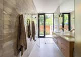 An outdoor shower extends off the main bathroom.