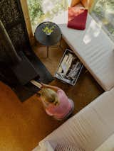 The corner is furnished with a Gladom side table and a throw pillow, and cushions from Ikea.&nbsp;