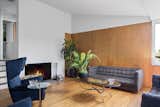 Placing the fireplace on the edge of the room instead of dead center looks and feels more intentional.&nbsp;
