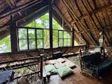Severino and Luna’s home features a thatched roof and built-in netted seating areas.