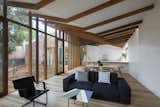 "The beams fold and taper back to the original roof line, which means each beam is unique, just like in nature," Dunin says.&nbsp;