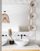 A homeowner’s love for Santorini, Greece, became the inspiration for her master bathroom’s tranquil upgrade.
