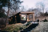 "The shipping container was placed on a cinder-block crawl space, which contains the furnace, the plumbing, and a tankless hot-water heater," Dianna says.