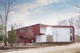 The home has a unique industrial aesthetic thanks to the use of eco-friendly structural insulated panels (SIPs) that are prefabricated off-site, manufactured with a minimum amount of waste, and then quickly assembled on the property. 