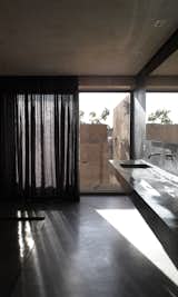Floor-to-ceiling glass doors frame the gorgeous outdoor views. 

