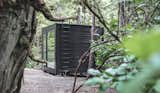 The prefab office is perfectly suited for the rugged, remote site and integrates seamlessly into the backyard.