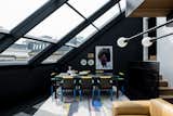 A glazed, sloping ceiling allows light to wash over the dining area. "<span style="font-family: Theinhardt, -apple-system, BlinkMacSystemFont, &quot;Segoe UI&quot;, Roboto, Oxygen-Sans, Ubuntu, Cantarell, &quot;Helvetica Neue&quot;, sans-serif;">We moved in before we started the work, so we got to experience the space,