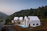 "By reversing the shape of the land and the house, we wanted to think about the relationship between house and nature and notion of form," said the firm.