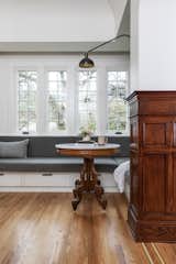 The team squared-off the bay window to form a new bump-out, which made room for the banquette to extend along the wall.