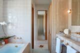 Spa-like bathrooms are the ideal place for a little R&R.