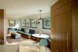 Cozy family room off of the kitchen with a custom built in eating area and sofa.