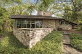 This stunning property features unique marble masonry—an element not found in any other Frank Lloyd Wright home.
