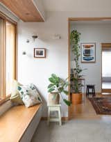 In the dining room next to the study is a deep window seat inserted on the north side of the home that overlooks the outdoor deck. 
