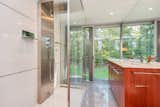The Porcelanosa master bath with a walk-in rain shower.