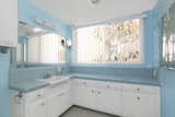 The home features one full bath and three partial baths. 