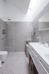 A peek inside one of the two bathrooms fitted with Vipp bathroom modules and accessories that include everything from the tap and soap dispenser to the bin and guest towels. 