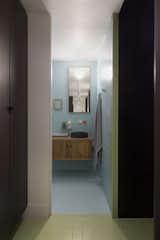 A peek inside the blue powder room, off to the side of the service area.