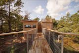 A view from the bridge toward the guesthouse on the left and the sauna on the right.