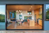 Designed for energy efficiency, the home features insulation above code and hydronic radiant heating. Note the Morso 6148 wood-burning stove in the entry hall that’s fueled by locally felled lumber.