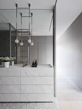 Antarctic White marble from STS Stone makes up the vanity in the principal bath.