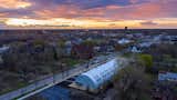 Manufactured by SteelMaster, the Quonset hut is a modular structure made from commercial-grade steel that can be assembled by a team of two to five people in a few days. Initially developed to provide military housing, the structures are known for their simple construction, strength, and versatility.