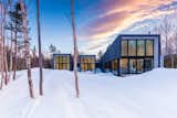 This 1,900-square-foot home was assembled on-site in just two days with wall panels consisting of staggered 2' x 4' studs on a 2' x 8' plate, which eliminates thermal bridging and maximizes energy efficiency.