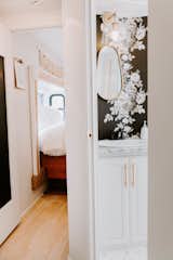 "The bathroom may have been my favorite transformation," explains Lauren. "I spotted some beautiful inspiration from Studio McGee and I was hooked on the floral wallpaper idea."

