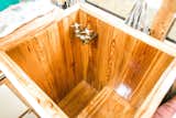 Our shower/tub. This photo was taken just before we completed the final touches to our reclaimed southern yellow pine tub basin. It now has a drain & shower head/wand. Southern yellow pine is a naturally sappy wood, this is why we chose it. After sealing seams and glazing with a few coats of a two-part mirror coat, it's perfect! We love that it's a little different, custom, it's us.