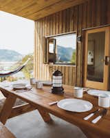 Outdoor tranquility is found while dining on one of the picnic tables or unwinding in a hammock.