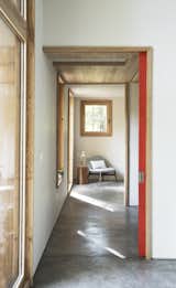 Large sliding pocket doors provide rooms with privacy while maintaining an open plan, maximizing flexibility in the space.
