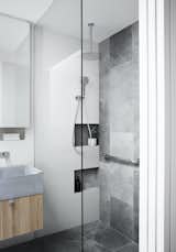 The home was designed with future accessibility in mind. The spacious shower has a grab rail, and the home is laid out over a single story for easy access.