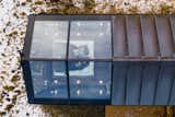 The harsh local climate—including strong winds and acid rain caused by the volcanic landscape—was a particular challenge. The cabin features a copper roof, which is one of the few materials that can cope with acid rain.