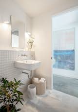 Ann Sacks pillow tiles in the lower level guest bath have a Japanese feel.