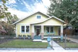 Budget Breakdown: A Butter-Yellow, Swooped-Roof Houston Home Gets a Secret Addition for $507K