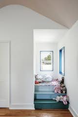 A little set of stairs leads to a reading nook in Alex's room. The stairs contain hidden storage. 