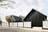 With its shou sugi ban exterior, high-pitched roof and monochrome palette, this family home nods to Japanese design.
