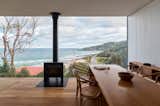“Where we let loose was on the window,” Matt says. “It’s an aluminium window frame, which is bushfire compliant and easy to install, but the way that we detailed it was about hiding the frame so that the eye is drawn into the space.”